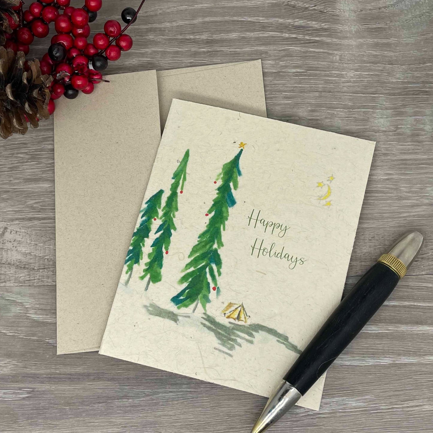 holiday card. christmas card. box set of christmas cards. unique christmas. christmas tree. vintage card. old fashioned card. plantable seed paper. plantable paper. 1 simple seed. outdoor. hiking. camping. minimalist card. adventure christmas. 