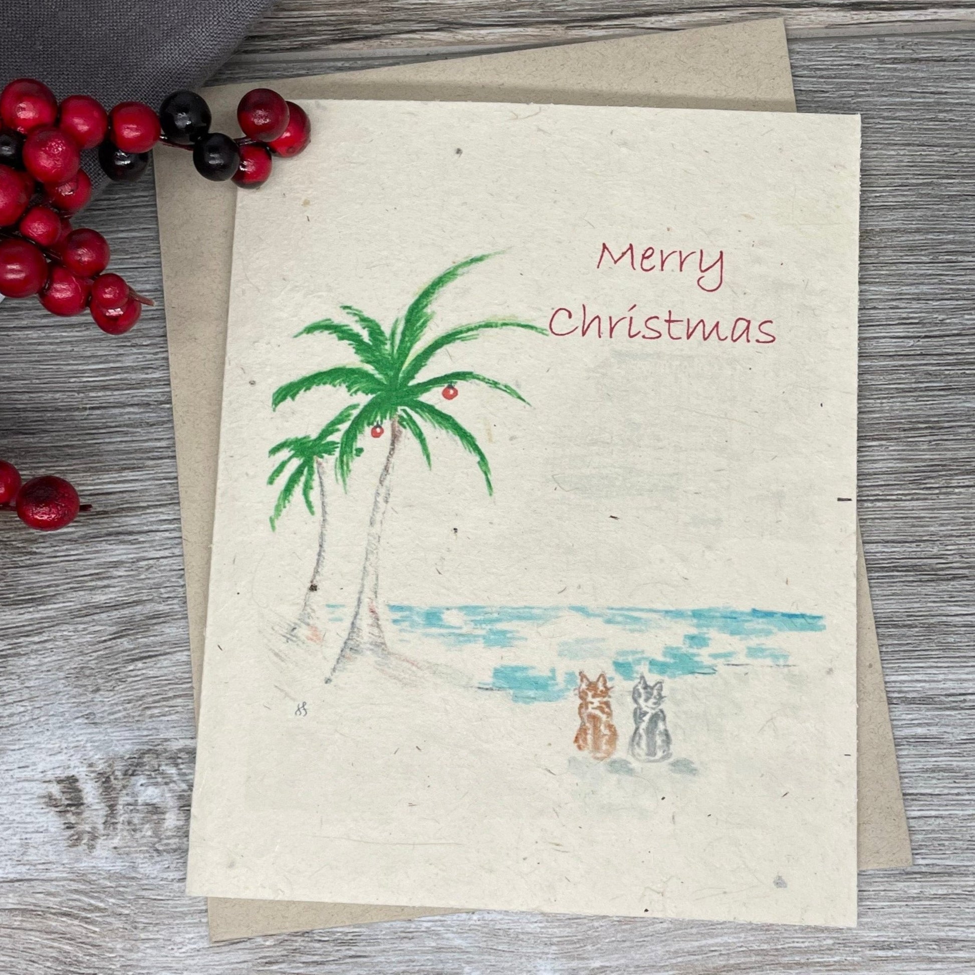 holiday card. christmas card. box set of christmas cards. unique christmas. christmas tree. vintage card. old fashioned card. plantable seed paper. plantable paper. 1 simple seed. outdoor. hiking. camping. minimalist card. Dog christmas card. cat christmas card. pet card.adventure christmas. Beach Christmas. tropical christmas