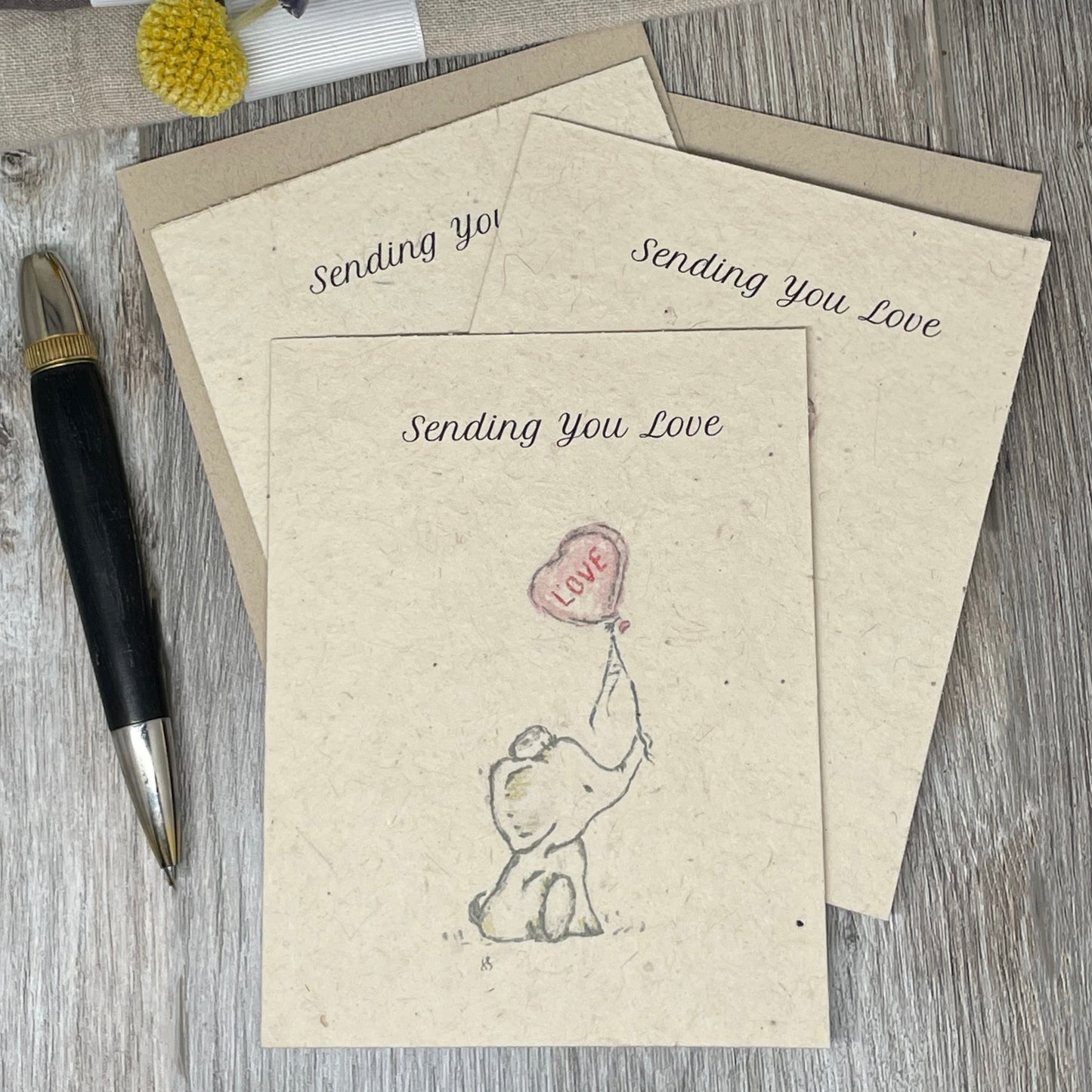 sending love card. friendship card. plantable card.  Elephant.  Wildflower seed paper.